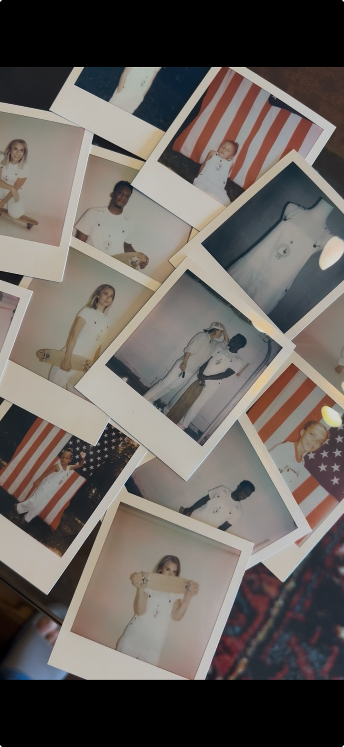 A scattered arrangement of vintage-style instant photographs showing people in white clothing, with several featuring American flags in the background.